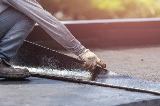 Professional Basement Waterproofing technician working in Morgantown, KY